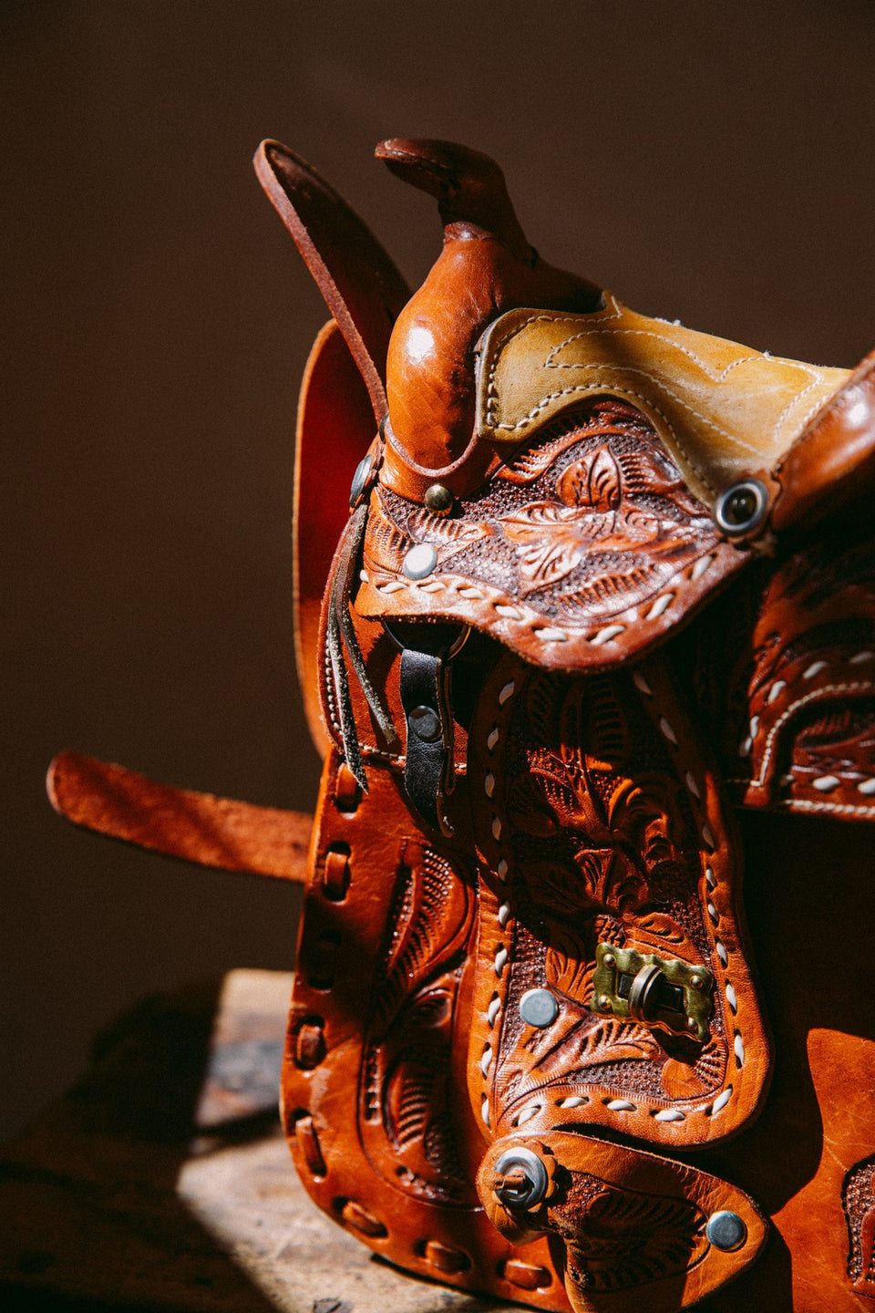 vintage tooled leather saddle bag