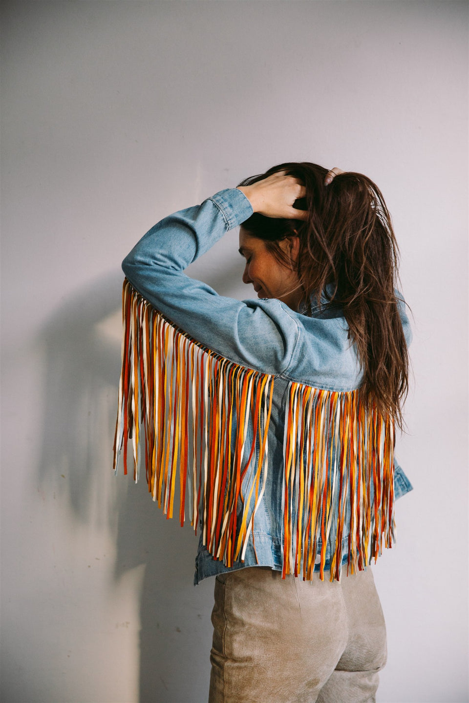 Skully denim jacket with fringe detail